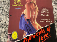 Load image into Gallery viewer, Moments of Love Promo Ad Slick 1982 Rhonda Jo Petty &amp; John Holmes
